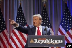 President-elect Donald Trump speaks as he arrives for a meeting with the House GOP conference, in Washington, Nov. 13, 2024.