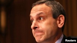 Douglas Shulman, former commissioner of the Internal Revenue Service, testifies before the Senate Finance Committee in Washington, May 21, 2013. 