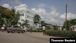 People are seen going into the National hospital after resident doctors commence a doctors strike, as coronavirus disease (COVID-19) infection continues to rise in Abuja, Nigeria June 15, 2020.