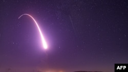 This U.S. Air Force handout photo shows an unarmed Minuteman III intercontinental ballistic missile launching during an operational test on Oct. 2, 2019 at 1:13 a.m. Pacific Time, at Vandenberg Air Force Base, California.