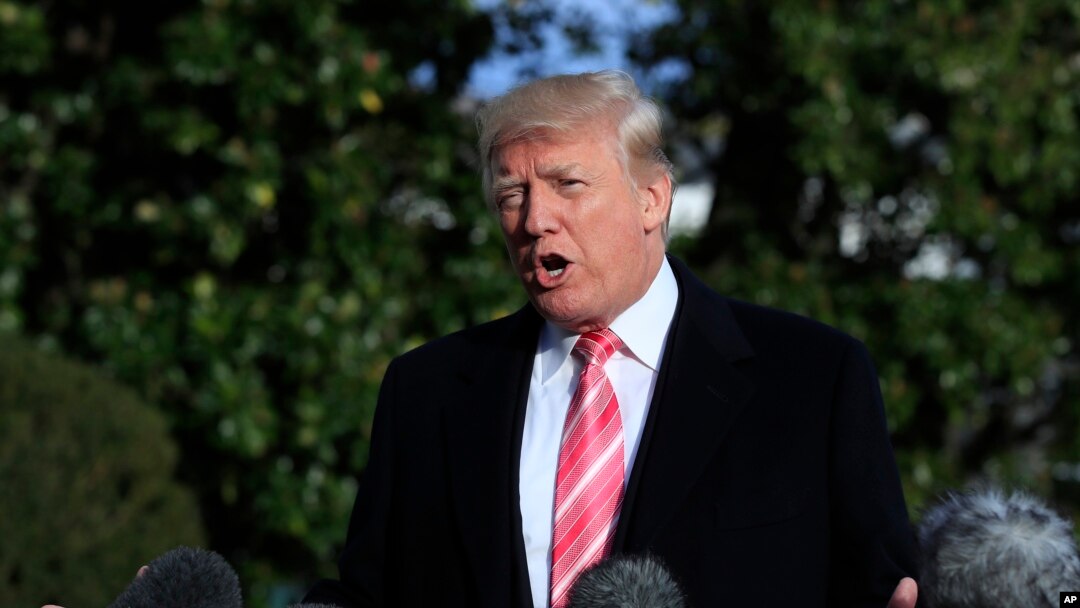 President Donald Trump speaks to reporters before leaving the White House, Nov. 21, 2017, in Washington, for a Thanksgiving trip to Mar-a-Lago estate in Palm Beach, Fla. Silent for more than a week, Trump all but endorsed embattled Alabama Republican Sena