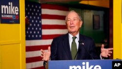Democratic presidential candidate Michael Bloomberg speaks to the media in Phoenix, Nov. 26, 2019.