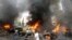 A car bomb explodes on July 9 in Beirut's southern suburbs, stronghold of Lebanon's Shiite Hezbollah movement, one of several attacks linked to Hezbollah's role in the Syrian civil war.