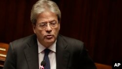 Paolo Gentiloni gives his first speech as the Italian prime minister to the lower house in Rome, Dec. 13, 2016. Gentiloni later received a vote of confidence from the lower house of parliament.