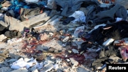 Blood stains are seen at a detention center for mainly African migrants that was hit by an airstrike in the Tajoura suburb of Tripoli, Libya, July 3, 2019.