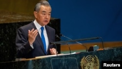 Foreign Minister of the People's Republic of China Wang Yi addresses the "Summit of the Future" in the General Assembly hall at United Nations headquarters in New York City, Sept. 23, 2024. 