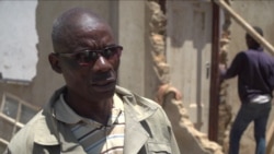 Bigboy Mabhande is hoping to rebuild his home. (Colombus Mavhunga/VOA)