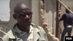 Bigboy Mabhande is hoping to rebuild his home. (Colombus Mavhunga/VOA)