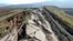 FILE: Cracks along the road near Koseli village in Pazarcik, Kahramanmaras, southern Turkey, Sunday, Feb. 12, 2023 following last week's earthquake
