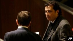 FILE - Francesco Schettino attends his trial at the Grosseto court, Italy, Feb. 11, 2015. 