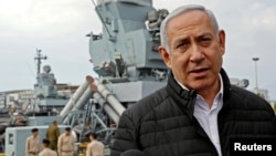 Israeli Prime Minister Benjamin Netanyahu gives a statement during his visit to a navy base in Haifa, Israel, Feb. 12, 2019.