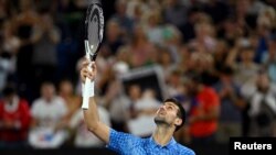  Mserbia Novak Djokovic akishangilia ushinda mechi yake ya raundi ya nne dhidi ya Alex De Minaur wa Australia.REUTERS
