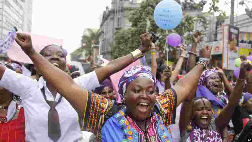 Women from Kenya, Uganda, Tanzania, Rwanda and Burundi participate in the world march of woman in Nairobi, Kenya