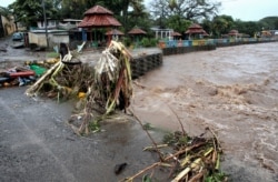 Garbage and debris are seen in the Masachapa river after Hurricane Eta swept the Nicaraguan Caribbean coast in Masachapa, Nov. 4, 2020.