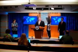 FILE - Secretary of State Pompeo speaks during a press conference at the State Department, June 24, 2020 in Washington.