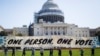 Supporters of the activist group 'Democracy Spring,' which have been staging protests for a week at the U.S. Capitol to 'end the corruption of big money in our politics and ensure free and fair elections,' gather for a rally on the West Lawn of the U.S. Capitol in Washington DC, USA, 15 April 2016. Several dozen activists were later arrested at a sit-in. EPA/JIM LO SCALZO