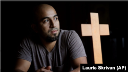 Alex Garcia, an immigrant who has sought sanctuary from deportation since 2017 at Christ Church United Church of Christ in Maplewood, Mo, poses for a portrait on Sunday, Jan. 28, 2018. 