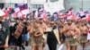 Indigenous Māori people walk through the streets of Wellington, New Zealand to protest against a proposed law that would redefine the country's founding agreement between Indigenous Māori and the British Crown, Nov. 19, 2024.