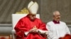 Pope Francis presides over the Good Friday Passion of the Lord service in Saint Peter's Basilica at the Vatican, March 29, 2024.