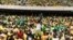 Supporters wearing T-shirts depicting South African President Cyril Ramaphosa attend the African National Congress election manifesto launch at the Moses Mabhida Stadium in Durban on Feb. 24, 2024.