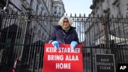 Leila Soueif, who has been on hunger strike seeking the release of her son Alaa Abdel Fattah from prison in Egypt, stands outside Downing Street in London, Feb. 5, 2025.