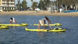 海上桨板瑜伽成新冠期间运动新宠