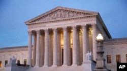 FILE - The U.S. Supreme Court building at dusk on Capitol Hill in Washington. 