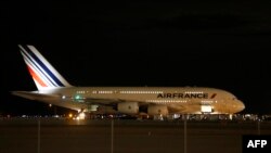 Air France Airbus 380, Flight 65, sits on the runway at the Salt Lake City International Airport being inspected by the FBI on November 17, 2015 in Salt Lake City, Utah. 