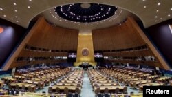 FILE - The U.N. General Assembly Hall is empty before the start of the U.N. General Assembly 76th session General Debate at United Nations Headquarters, in New York, Sept. 20, 2021.