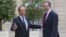 France’s President Francois Hollande, left, welcomes Greece's Prime Minister Antonis Samaras at the Elysee Palace, Paris, August 25, 2012.