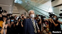 Democratic Party founder and barrister Martin Lee leaves the West Kowloon Courts after he was found guilty in landmark unlawful assembly case, in Hong Kong, China April 1, 2021. 