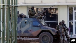 Members of the regional ECOWAS force keep guard at Presidence palace in Banjul, Gambia, Jan. 23, 2017.