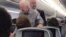 Former president Jimmy Carter shakes hands with every passenger on a recent flight from Atlanta, Georgia, to Washington, D.C. (Twitter - @UPROXX)
