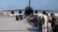 FILE - Passengers board a US Air Force C-17 Globemaster III at Hamid Karzai International Airport, Afghanistan, Aug. 24, 2021. (US Air Force Photo)