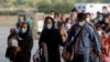 US Resumes Afghan Refugee Flights After Measles Shots 