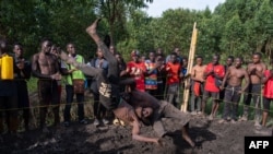 FILE—Members of Uganda's Soft Ground Wrestling battle during a training session in Mukono on February 28, 2024.