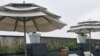 Former Maldives President Mohamed Nasheed poses for a picture at the poolside of a hotel in New Delhi, India, April 18, 2012.