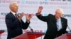 Democratic presidential candidates former Vice President Joe Biden, left, and Sen. Bernie Sanders, speak during a Democratic presidential primary debate, Dec. 19, 2019, in Los Angeles.