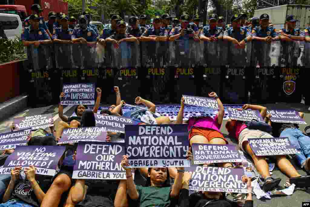Women Youth and Student groups led by Gabriela stage a protest outside the US embassy in the run up to International Women&#39;s Day in Manila.