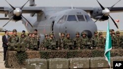 Lebanese army soldiers stand in front of French weapons at the Rafik Hariri International Airport in Beirut, Lebanon, April 20, 2015.