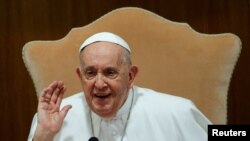 FILE - Pope Francis attends the World Meeting on Human Fraternity at the Vatican on May 11, 2024. Francis apologized on May 28, 2024, for using a derogatory and vulgar term about gay people in a private meeting earlier this month.