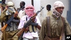 Shabab militia patrol Bakara Market in Mogadishu (Oct 2009 file photo)