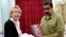 Venezuelan President Nicolas Maduro (R) talks with Attorney General Luisa Ortega Diaz during a meeting at Miraflores presidential palace in Caracas, April 1, 2017. (Presidencia de Venezuela Handout)