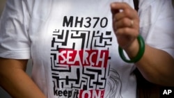 เสื้อรณรงค์ของญาติผู้สูญหายในเที่ยวบิน MH370