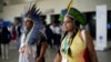 Members of Brazil's Indigenous delegation arrive to the opening ceremony of COP16, a United Nations' biodiversity conference, in Cali, Colombia, Oct. 20, 2024.