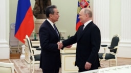 2023年2月22日，俄罗斯总统普京与中共中央政治局委员、中央外事办主任王毅在莫斯科举行会谈。