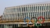 FILE - The Olympic rings are seen in front of the International Olympic Committee (IOC) headquarters, in Lausanne, Switzerland, Feb. 24, 2021.