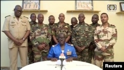 Niger Army spokesman Colonel Major Amadou Adramane speaks during an appearance on national television