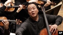 FILE - Cellist Yo-Yo Ma at a rehearsal of Rhode Island Philharmonic at the VMA Arts & Cultural Center in Providence, R.I., March 7, 2006. 