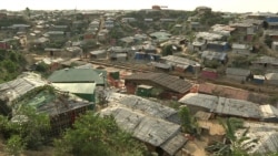 Aid groups say the strain of daily life in Rohingya refugee camps in Bangladesh, in which refugees are not allowed to leave, adds to emotional stress. (Dave Grunebaum/VOA)